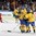 MALMO, SWEDEN - DECEMBER 26: Sweden players celebrate after a first period goal against Switzerland during preliminary round action at the 2014 IIHF World Junior Championship. (Photo by Andre Ringuette/HHOF-IIHF Images)